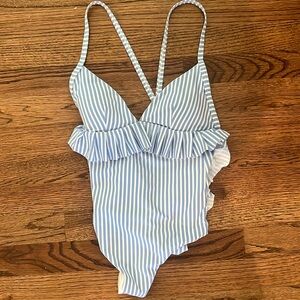 AVEC LES FILLES.            BATHING SUIT NEVER WORN.